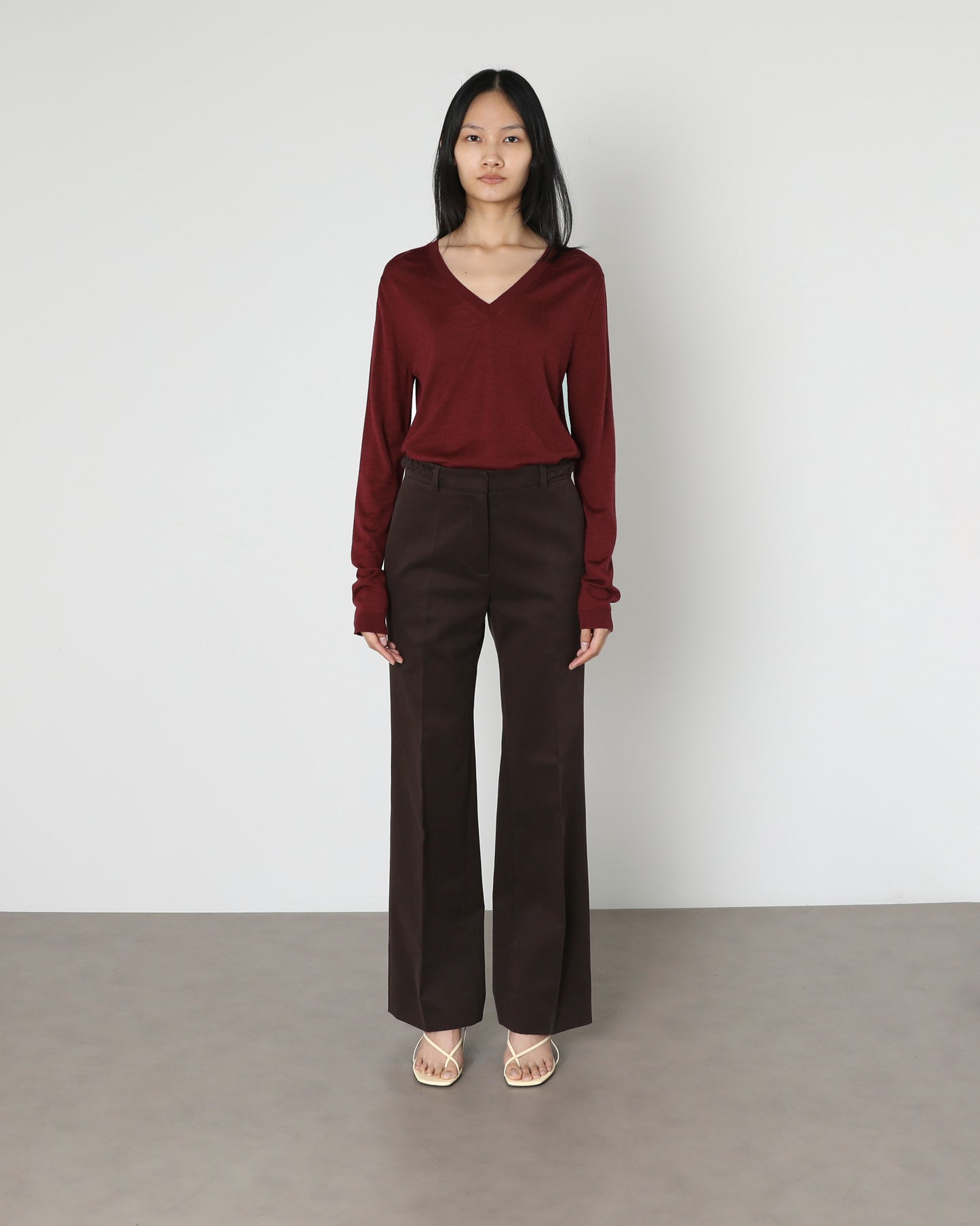 Model wears Issue Twelve Marlene Trouser in Cotton Brown