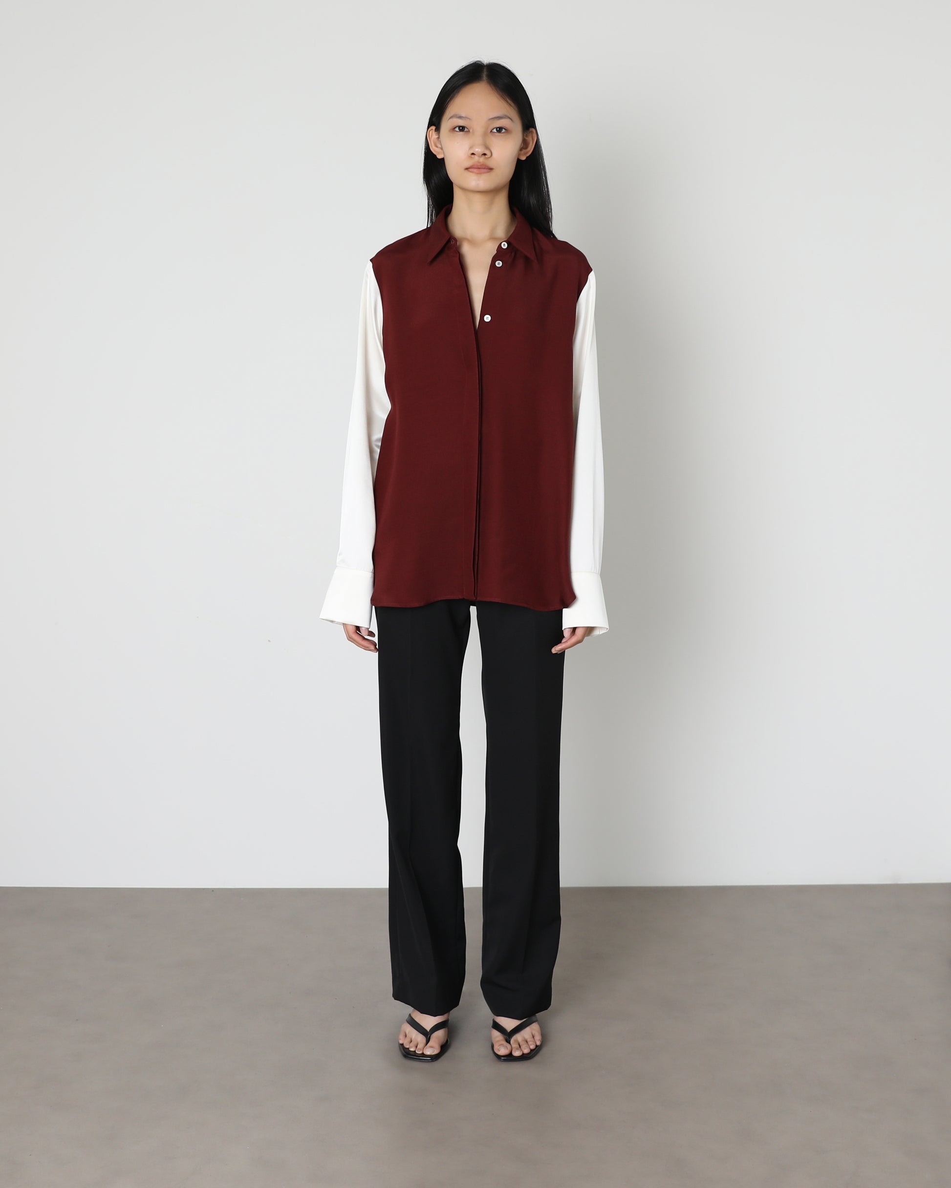 Model wears Issue Twelve Ester Shirt in Burgundy Wool Silk