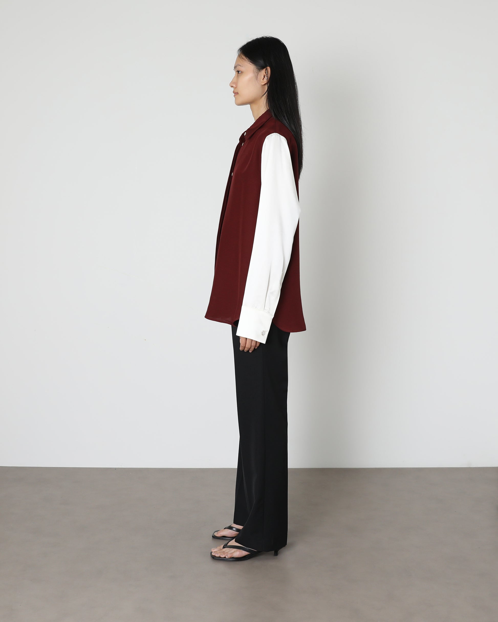 Model wears Issue Twelve Ester Shirt in Burgundy Wool Silk