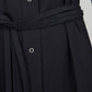 Detail of the silver buttons on the Issue Twelve Joan Dress in black cotton