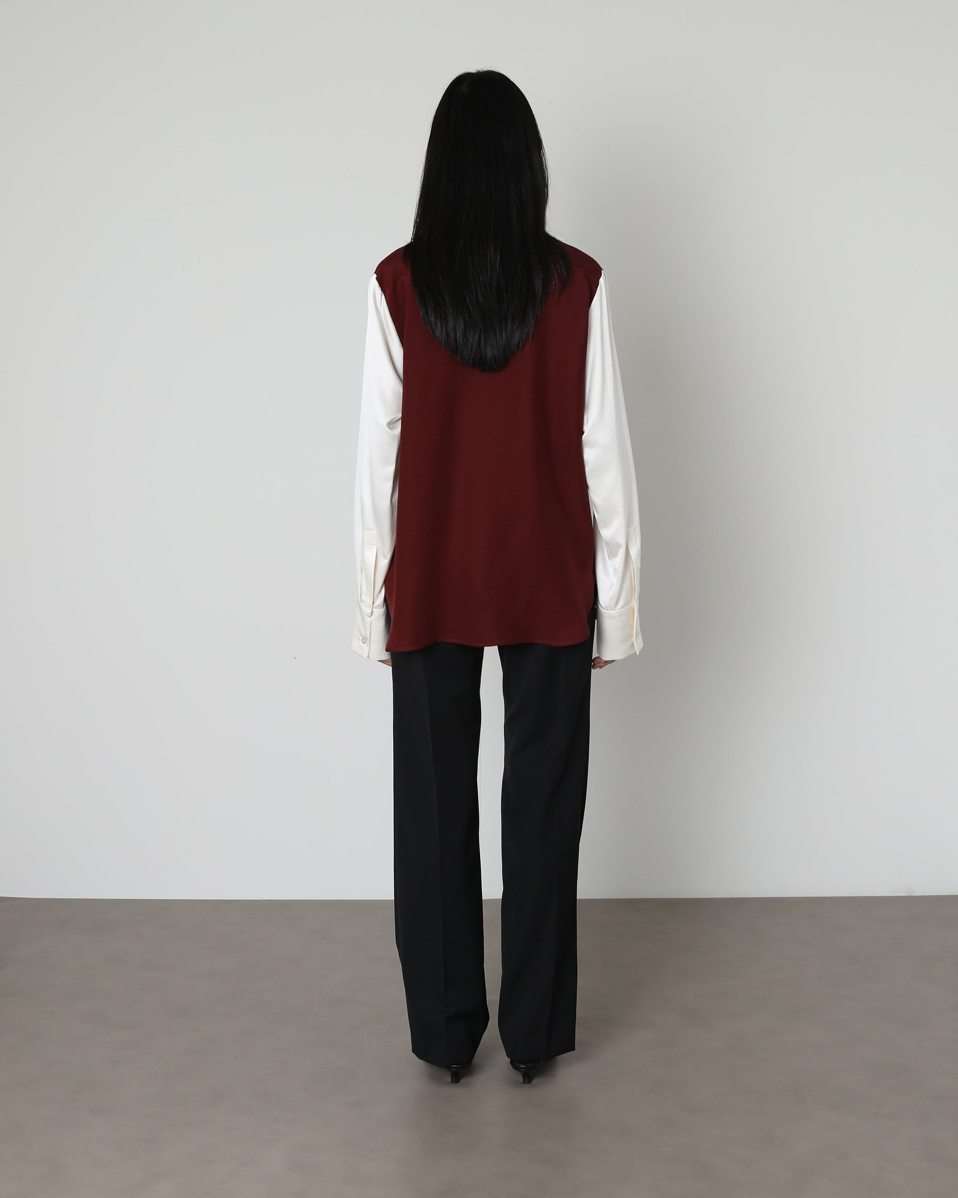 Model wears Issue Twelve Ester Shirt in Burgundy Wool Silk