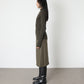 Model wears Issue Twelve Nina Jumper in Wool Green